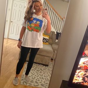 Halloween graphic peanuts pumpkin Charlie Brown graphic Tee. The great pumpkin.